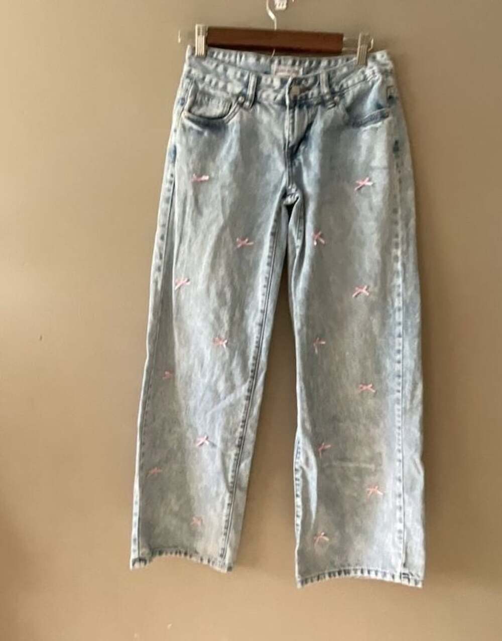 LOVE SOHO Light Wash Denim Jeans with Pink Bow Accents